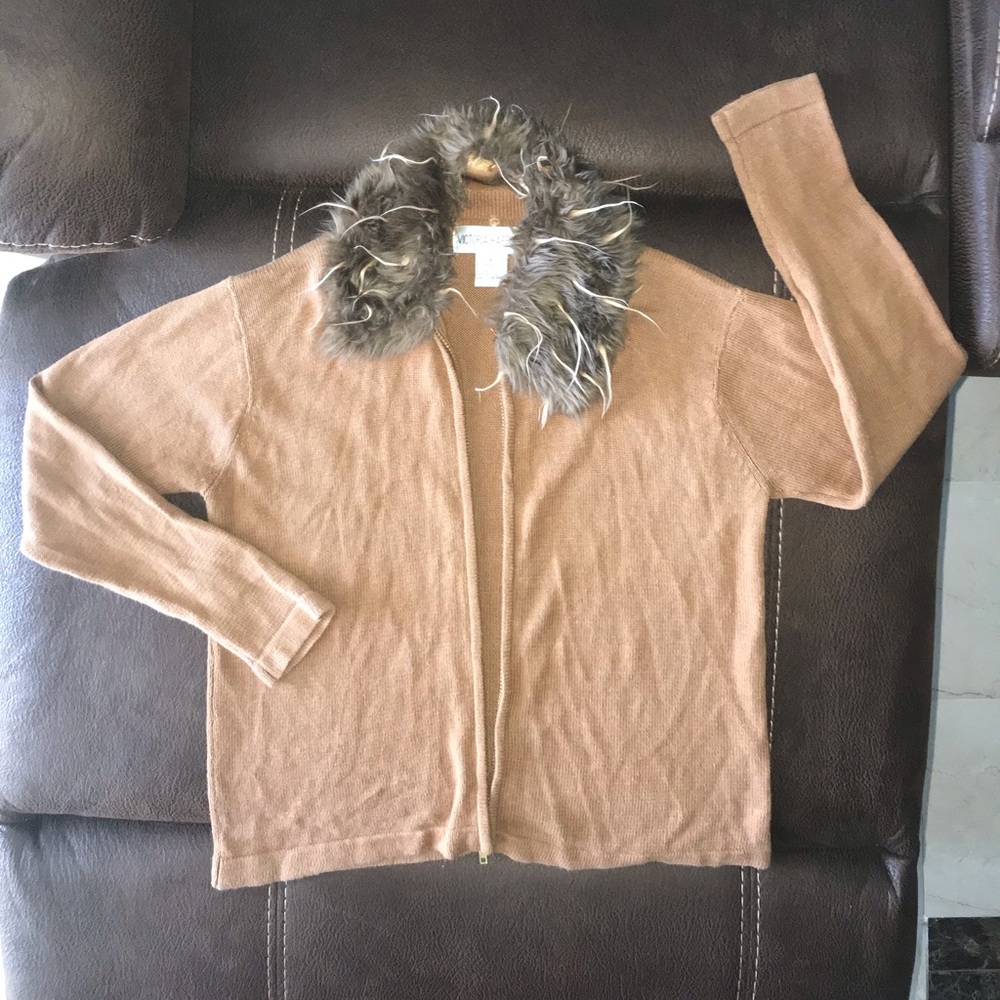 Light weight sweater.  Soft, feather like collar